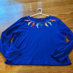 XL Onque Casuals holiday shirt with Christmas stockings around the neckline.